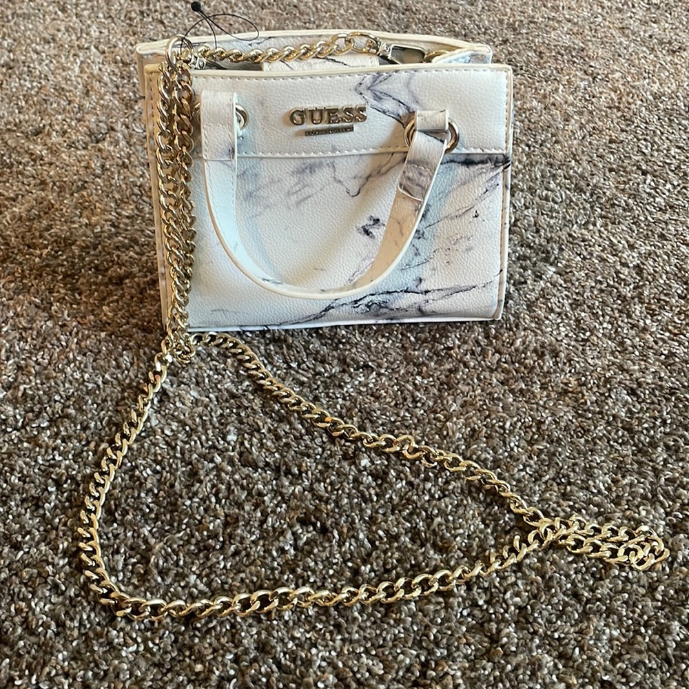 Marble Guess evening purse with removable gold chain. Never used.
